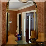 DM01. Gilt and black beveled glass mirror. 44”h x 29”w 